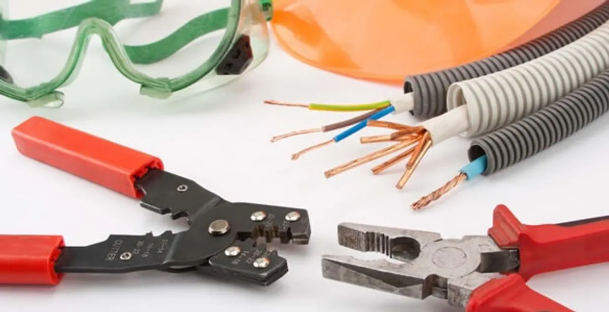 Electrical wiring repair with professional tools and safety equipment in Rocky River, OH